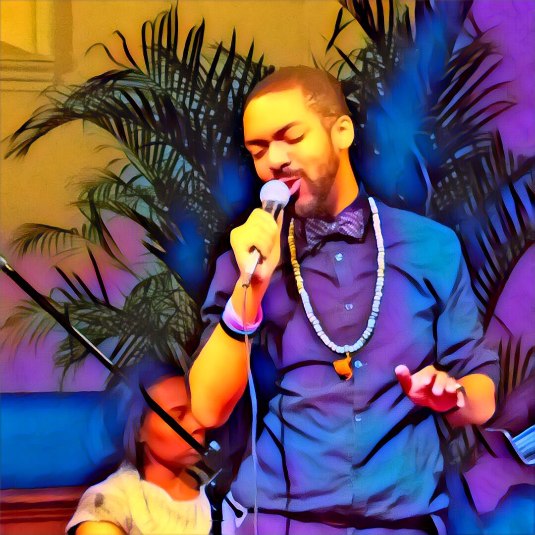 Dr. Flow performing live with a microphone